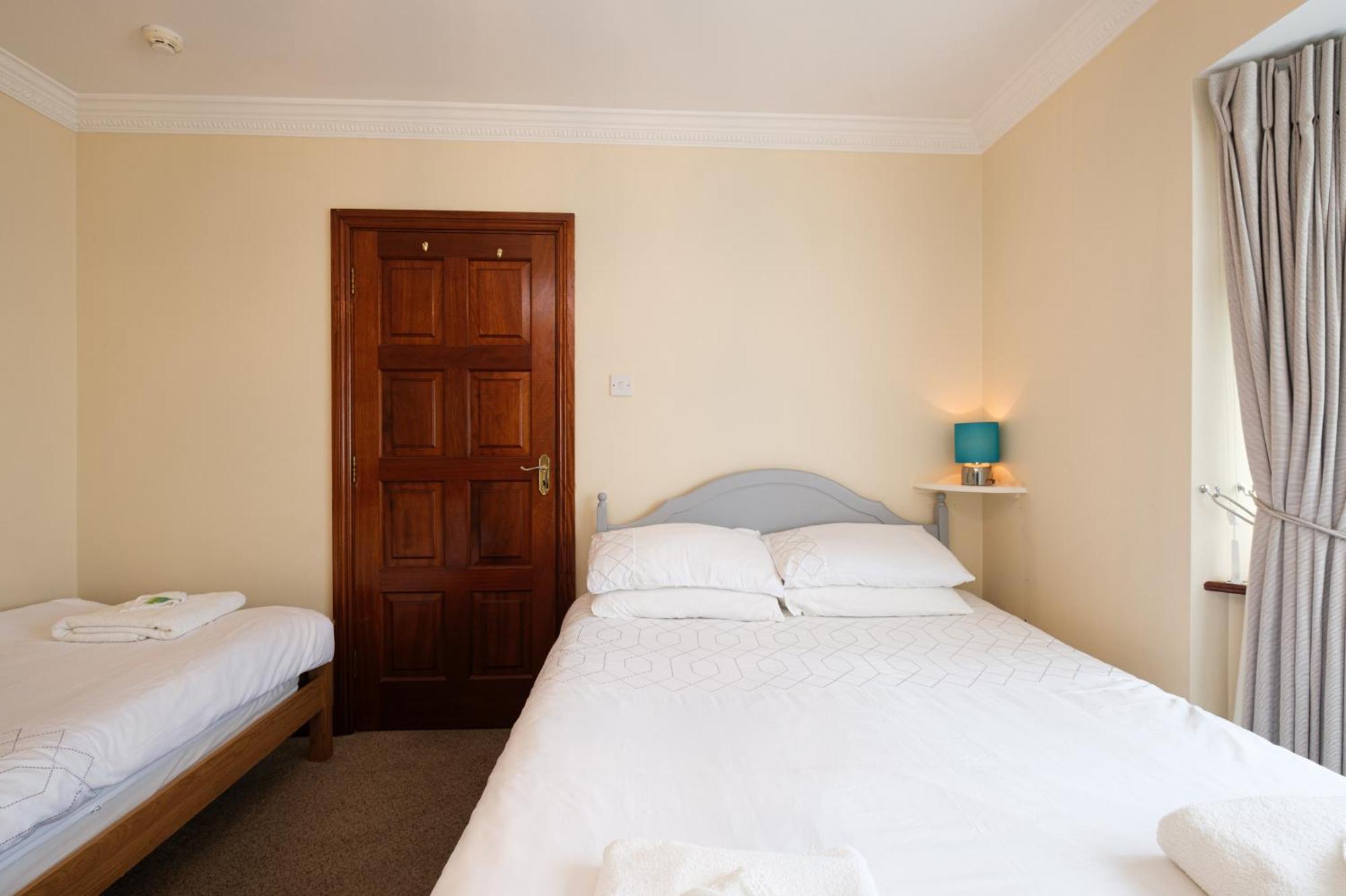 Chambre Triple avec Douche